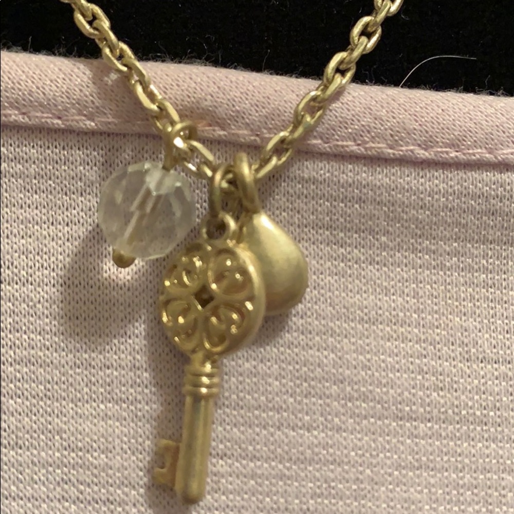Key with crystal and gold bead necklace